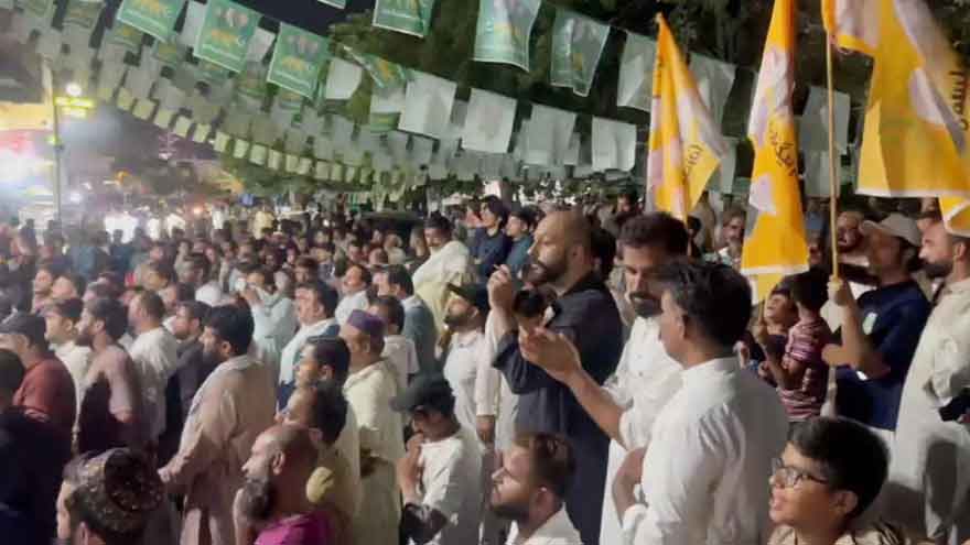 Election staff counting ballot papers during Azad Jammu and Kashmir Legislative Assembly elections.