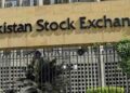 Electronic trading board at the Pakistan Stock Exchange showing the KSE-100 Index falling during Wednesday's trading session.