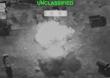 Smoke rises after US airstrikes target Iranian military positions amid escalating conflict in the Middle East.