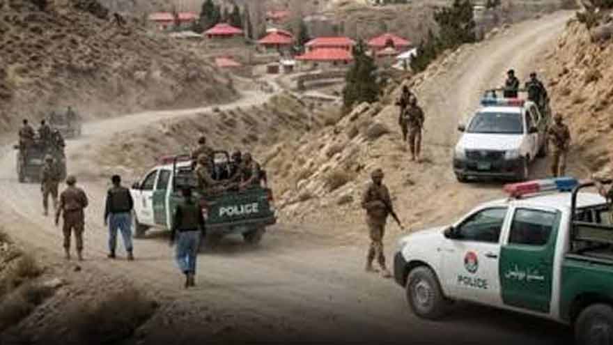 Security personnel inspect the area after six abducted labourers were found shot dead in Turbat, Balochistan.