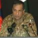 DG ISPR Lieutenant General Ahmed Sharif Chaudhry prepares to brief the media on Pakistan's security situation and counterterrorism operations.