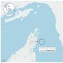 Commercial ships transit the Strait of Hormuz amid heightened military tensions between the United States and Iran