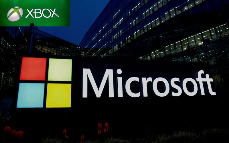 Microsoft logo displayed outside company headquarters following the announcement of Xbox restructuring and workforce reductions.