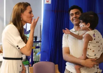Princess Kate speaking with children, families and healthcare staff during her visit to Evelina London Children’s Hospital in London.