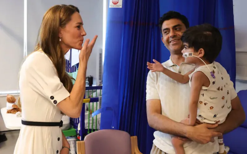 Princess Kate speaking with children, families and healthcare staff during her visit to Evelina London Children’s Hospital in London.