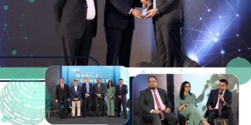 Representatives of ABHI Microfinance Bank receive the Phoenix Award during the Mobile Commerce 2026 event in Pakistan.