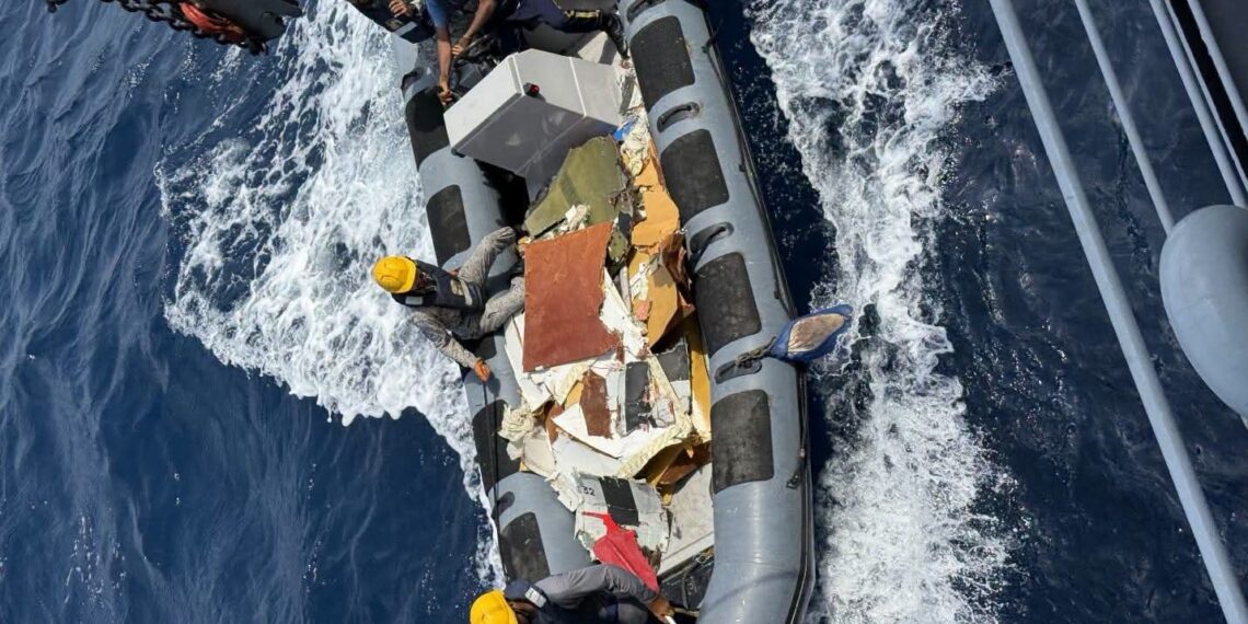 Pakistan Navy vessels conduct search and recovery operations near the wreckage of a K2 Airways cargo plane off the coast of Ormara.