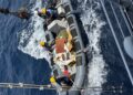 Pakistan Navy vessels conduct search and recovery operations near the wreckage of a K2 Airways cargo plane off the coast of Ormara.