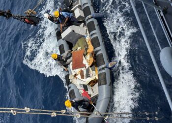 Pakistan Navy vessels conduct search and recovery operations near the wreckage of a K2 Airways cargo plane off the coast of Ormara.
