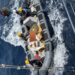 Pakistan Navy vessels conduct search and recovery operations near the wreckage of a K2 Airways cargo plane off the coast of Ormara.