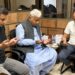 Pakistan Conservative Party Chairman Danish Channa meets PPP leader Raza Haroon during a meeting in Karachi.