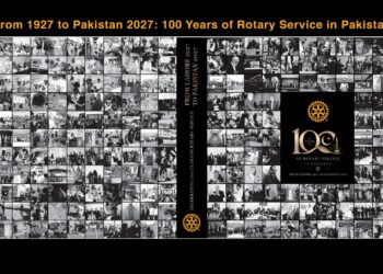 Rotary International District 3271 officials launch the book marking 100 years of Rotary service in Pakistan.