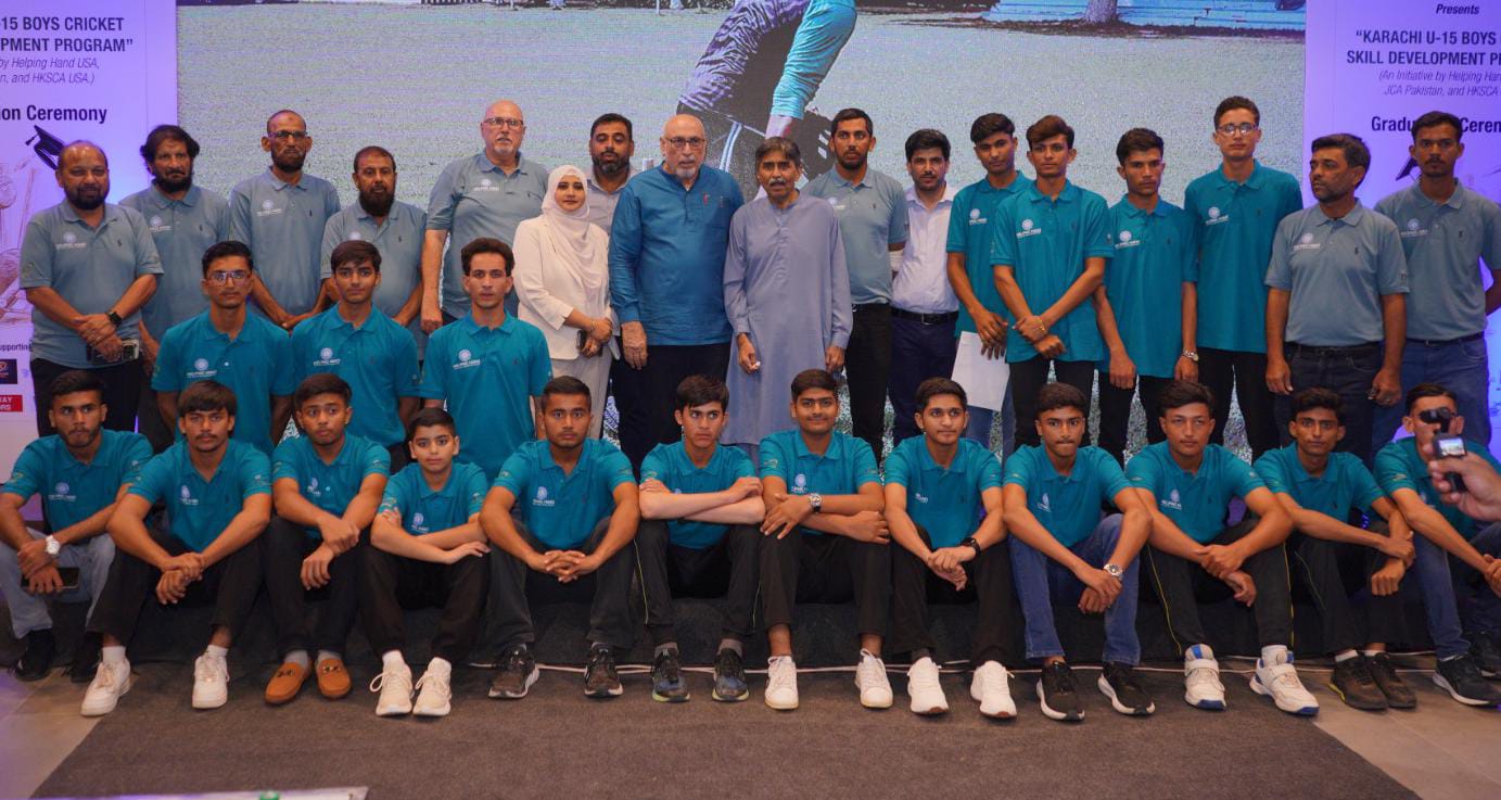 Javed Miandad distributes certificates to participants at the Karachi Under-15 Cricket Skill Development Program graduation ceremony.