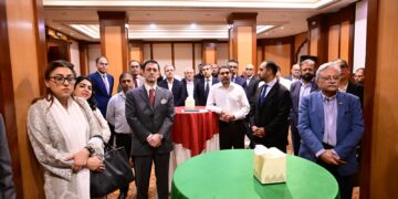 Italian Consul Fabrizio Bielli speaks at a Karachi business symposium promoting energy cooperation and investment between Italy and Pakistan.