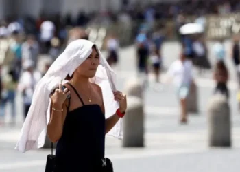 People seek shade during a severe heatwave in Germany as temperatures exceed 40°C.