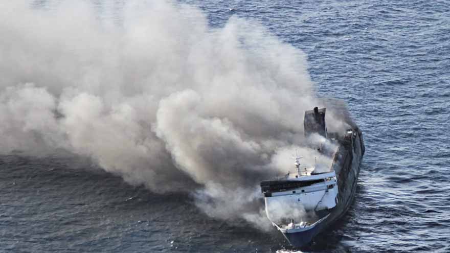 Rescue vessels assist passengers after a ferry caught fire at sea in Indonesia.