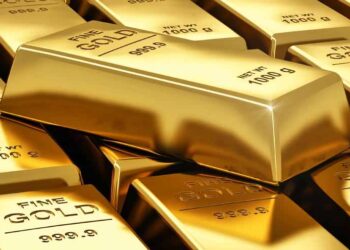 Gold bars and jewellery displayed as gold prices rise in Pakistan and international markets.