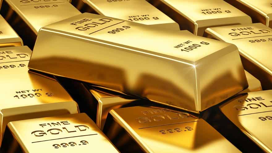 Gold bars and jewellery displayed at a bullion market as gold prices fall in Pakistan.