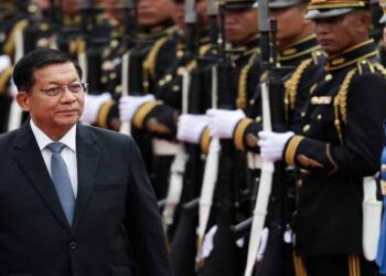 Myanmar President Min Aung Hlaing and Thai officials attend a ceremonial welcome in Bangkok during an official state visit.