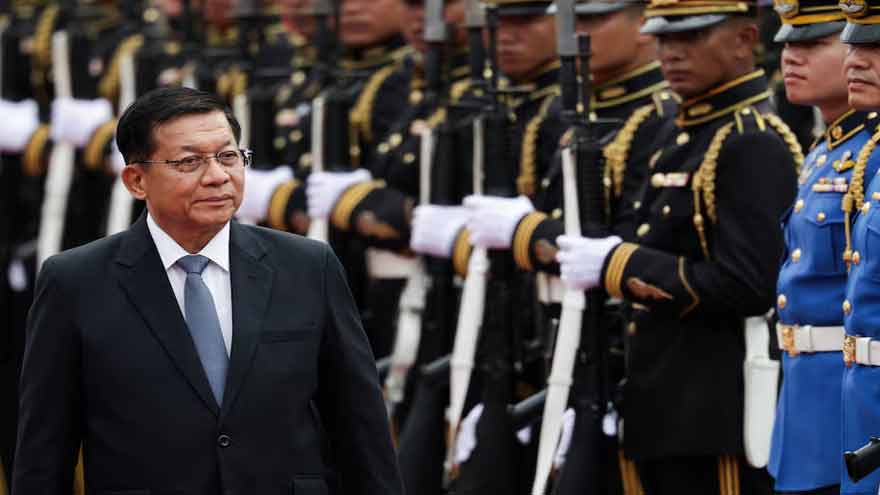 Myanmar President Min Aung Hlaing and Thai officials attend a ceremonial welcome in Bangkok during an official state visit.