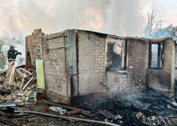 Rescue workers respond to damaged buildings following Russian air strikes in eastern and northern Ukraine.