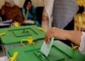 Election staff manage polling arrangements for the Azad Jammu and Kashmir general elections.
