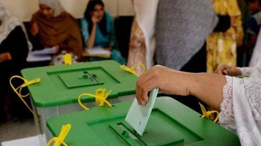 Election staff manage polling arrangements for the Azad Jammu and Kashmir general elections.