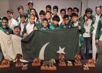 Pakistani young Scrabble players celebrate winning the world team title