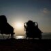 People in Spain and Iceland prepare to watch a total solar eclipse with protective glasses.