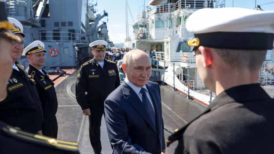 Russian President Vladimir Putin visits Iturup island in the disputed Kuril chain.