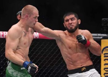 Islam Makhachev celebrates UFC welterweight title victory over Ian Machado Garry