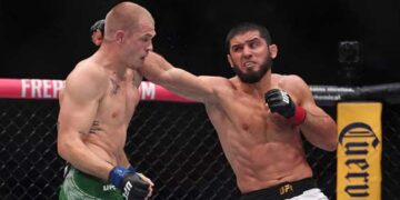 Islam Makhachev celebrates UFC welterweight title victory over Ian Machado Garry
