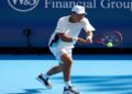 Brandon Nakashima celebrates after defeating Daniil Medvedev in Cincinnati