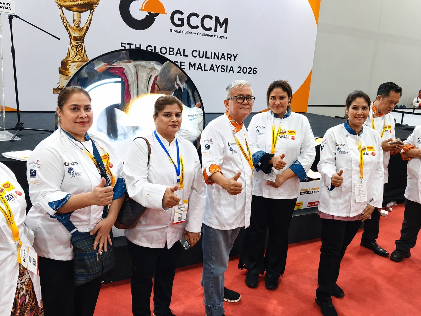 Members of the Karachi Chefs Association at the GCCM Global Culinary Competition in Malaysia after winning medals and diplomas.