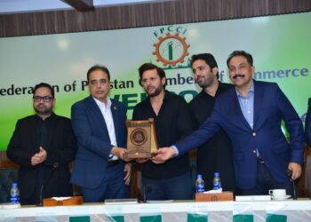 FPCCI President Atif Ikram Sheikh with Shahid Afridi at an evening supporting the Shahid Afridi Foundation.