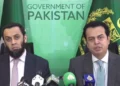 Tallal Chaudhry and Attaullah Tarar speaking at a press conference in Islamabad