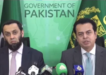 Tallal Chaudhry and Attaullah Tarar speaking at a press conference in Islamabad