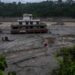 Rescue teams conducting operations after devastating floods and landslides in Nepal