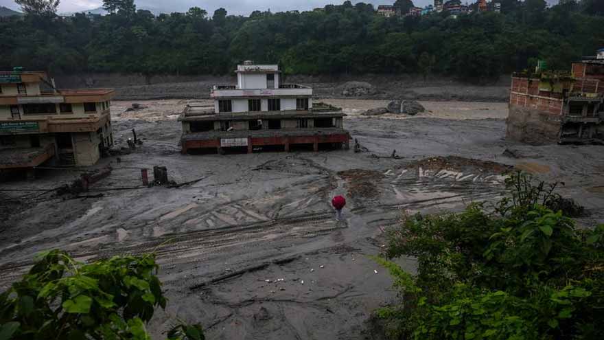 Rescue teams conducting operations after devastating floods and landslides in Nepal