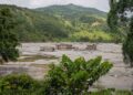 Rescue teams searching for survivors after a flood and landslide in Nepal