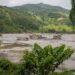 Rescue teams searching for survivors after a flood and landslide in Nepal