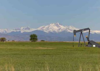 Oil infrastructure as crude prices fall amid US inventory and Saudi supply concerns.