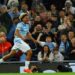 Floyd Samba celebrates scoring for Manchester City against Norwich City.