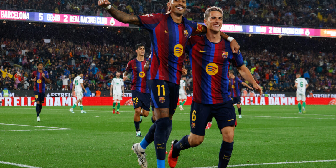 Raphinha celebrates his hat-trick during Barcelona’s 7-2 win over Racing Santander.
