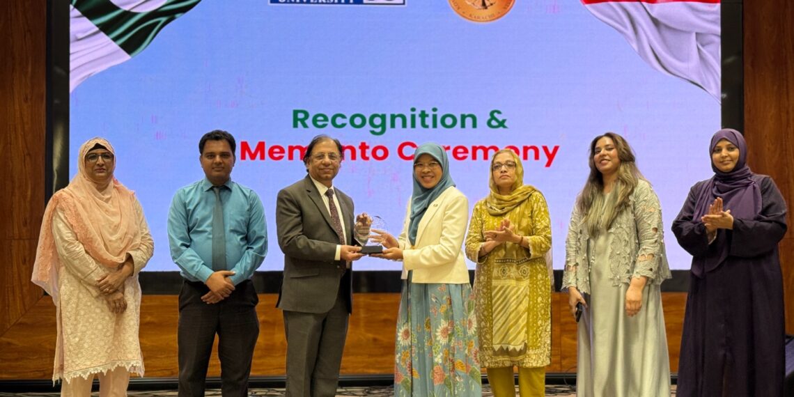 Indonesian and Pakistani students and academics attending a youth forum at Iqra University Karachi