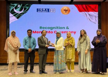 Indonesian and Pakistani students and academics attending a youth forum at Iqra University Karachi
