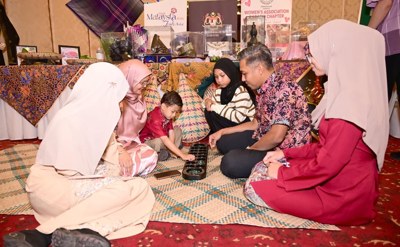 Students attend the Study in Malaysia Education Fair at Avari Towers Karachi.