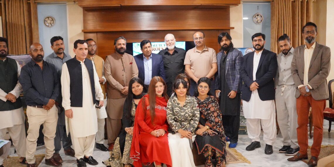 YKP Foundation ceremony honouring 1965 war heroes and Pakistan’s security forces in Karachi.