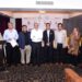Rotary Club Karachi Nexus members and officials attend a Literacy Month meeting.