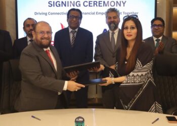 ABHI Microfinance Bank officials with SOS Group and South Air representatives at the partnership signing ceremony